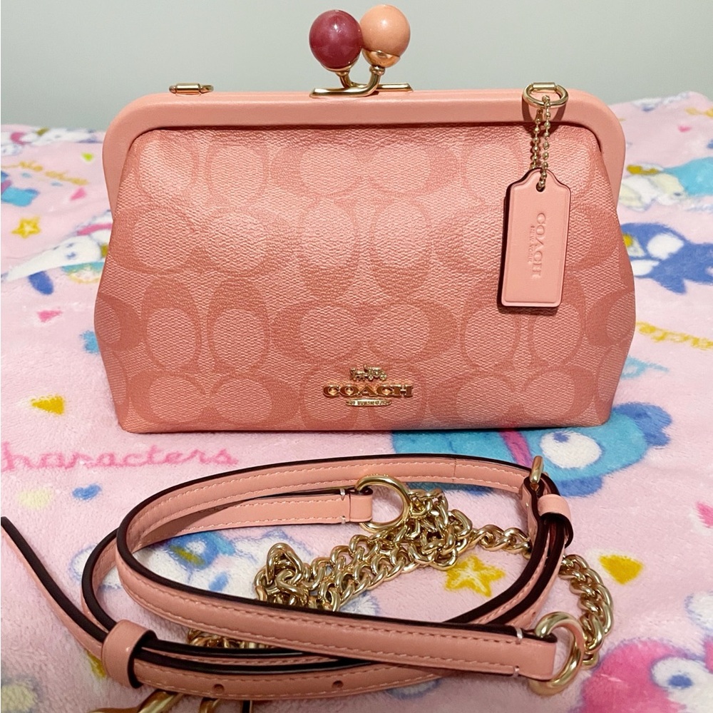 Coach Pink Signature Clutch with Chain Strap